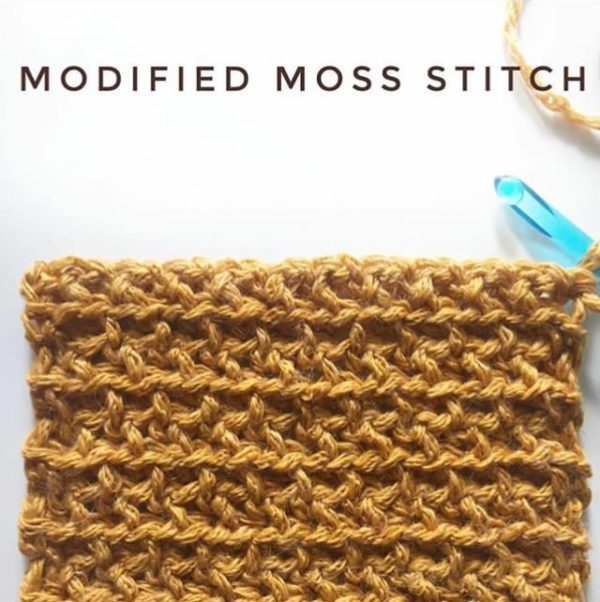 close up of crochet modified moss stitch with gold yarn