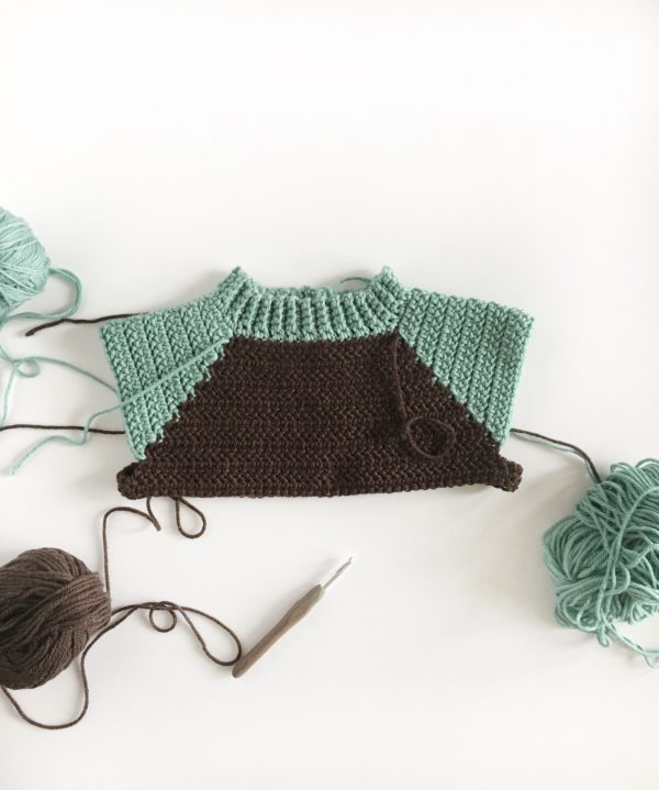 crochet two pocket baby sweater in progress