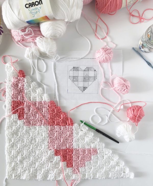 crochet gingham heart blanket in progress with graph