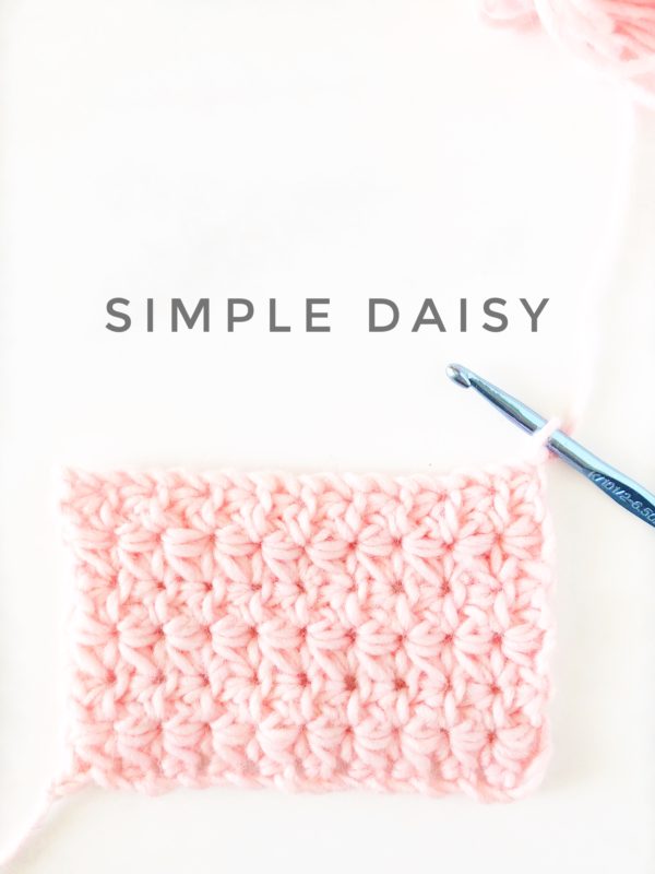 daisy stitch crochet swatch in pink yarn