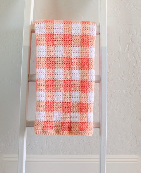 Crochet Cluster Stitch Gingham Blanket on ladder
