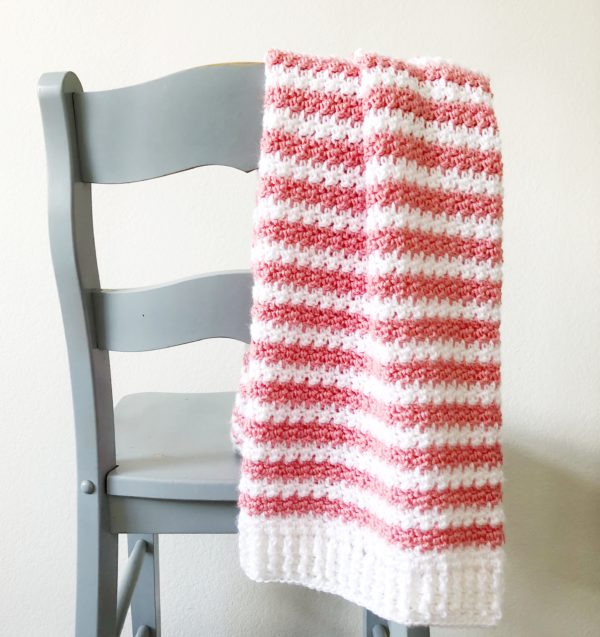 strawberry stripes blanket on chair