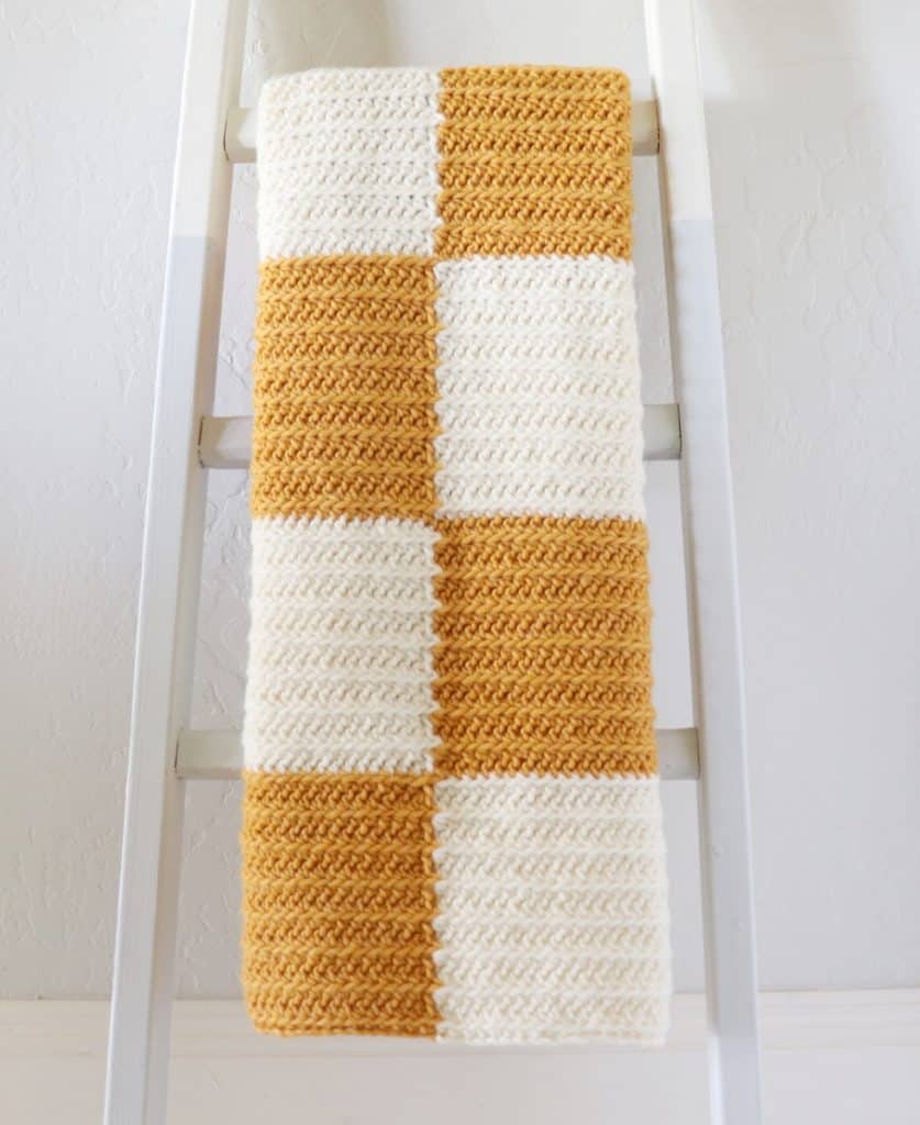 modern mustard color half stripe crochet blanket