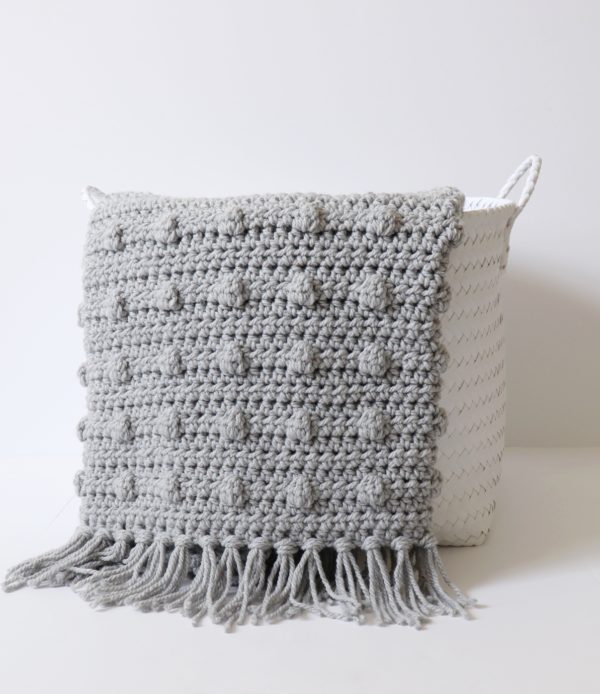 Crochet Dotted Edge Throw in basket