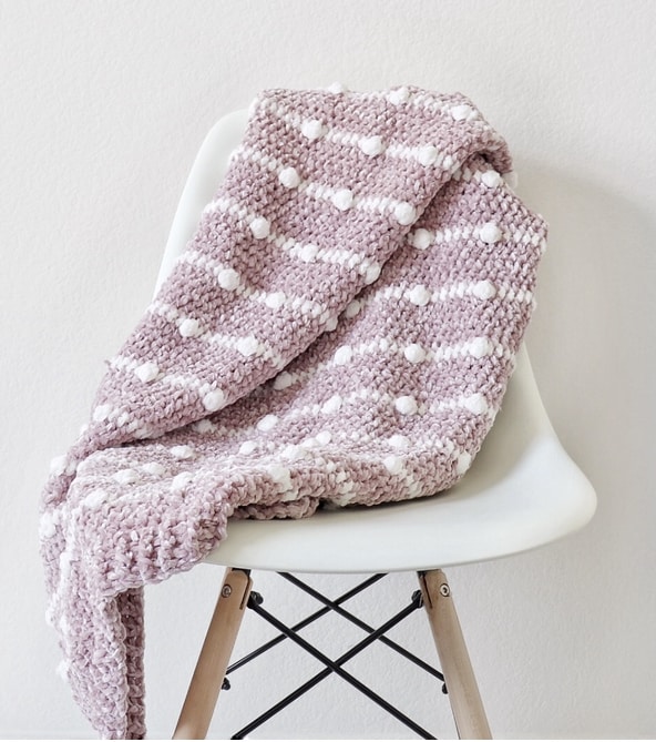 Crochet Velvet Dotted Lines Blanket on chair