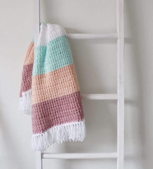 Crochet Boho Color Block Blanket on ladder