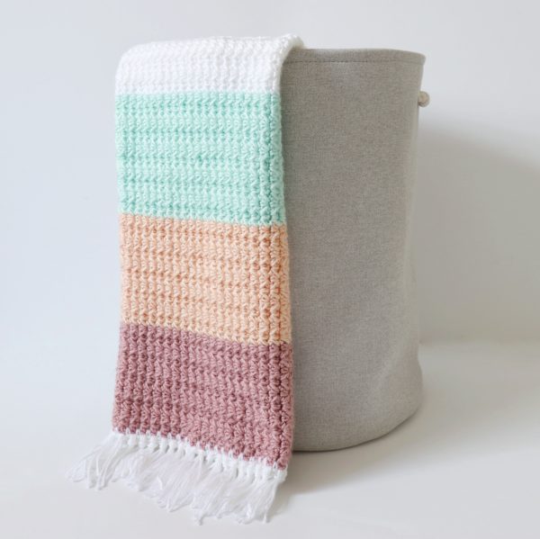 Crochet Boho Color Block Blanket in basket