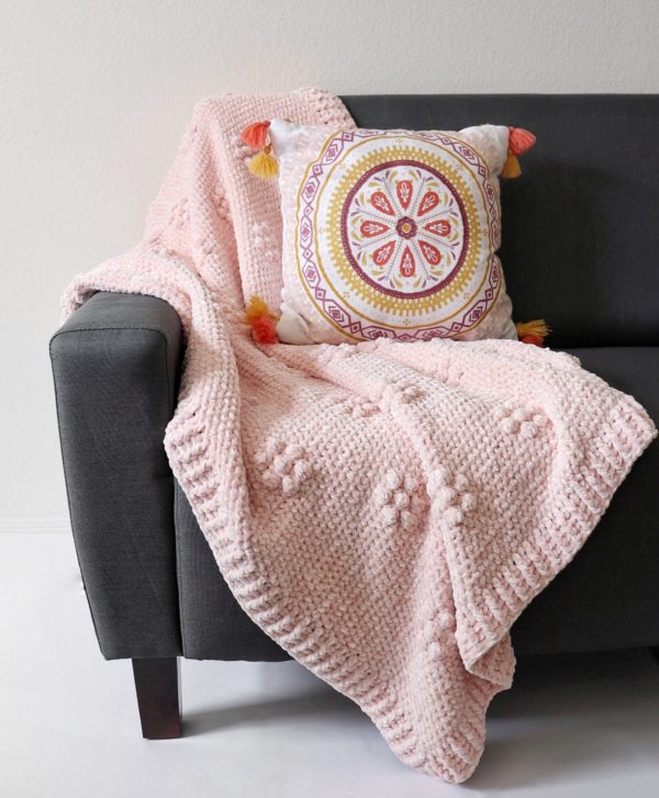 Crochet Velvet Flowers Throw on couch