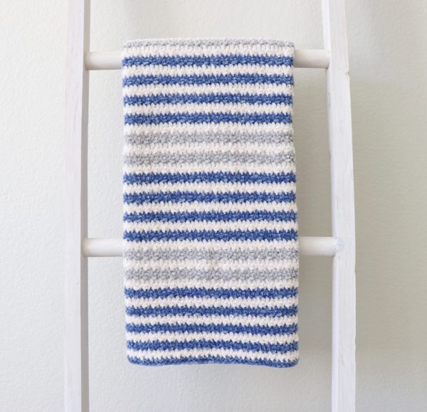 Crochet Cuddly Stripes Baby Blanket on ladder