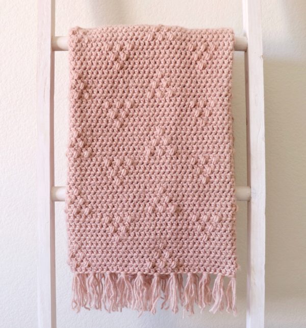 Crochet Triangle Puffs Blanket on ladder