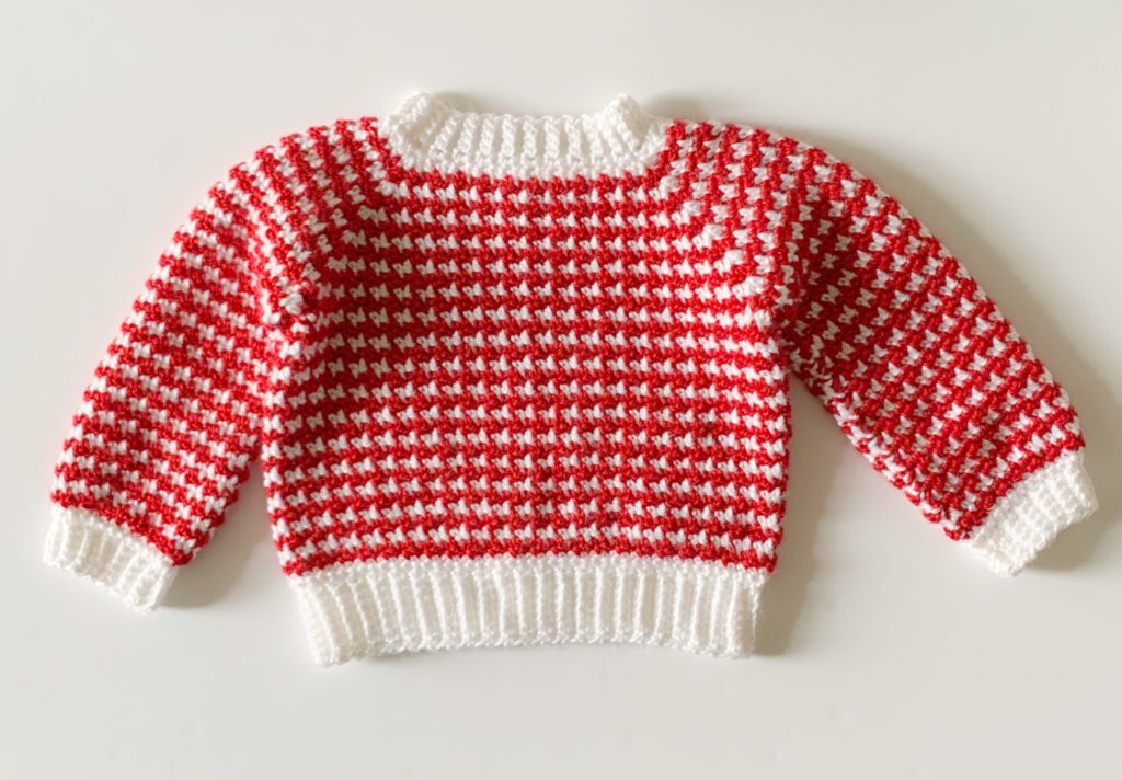 red and white crochet sweater
