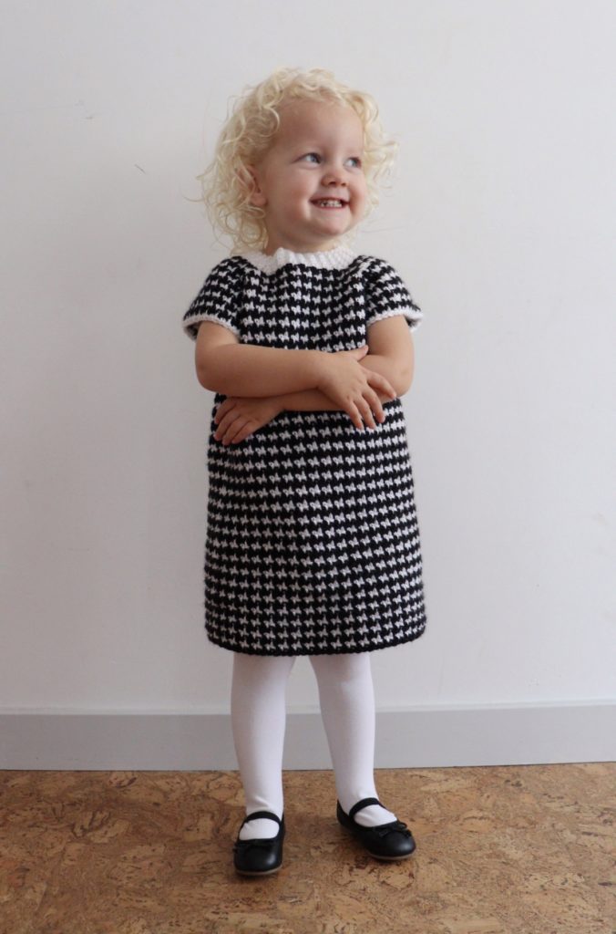 little girl wearing crochet dress