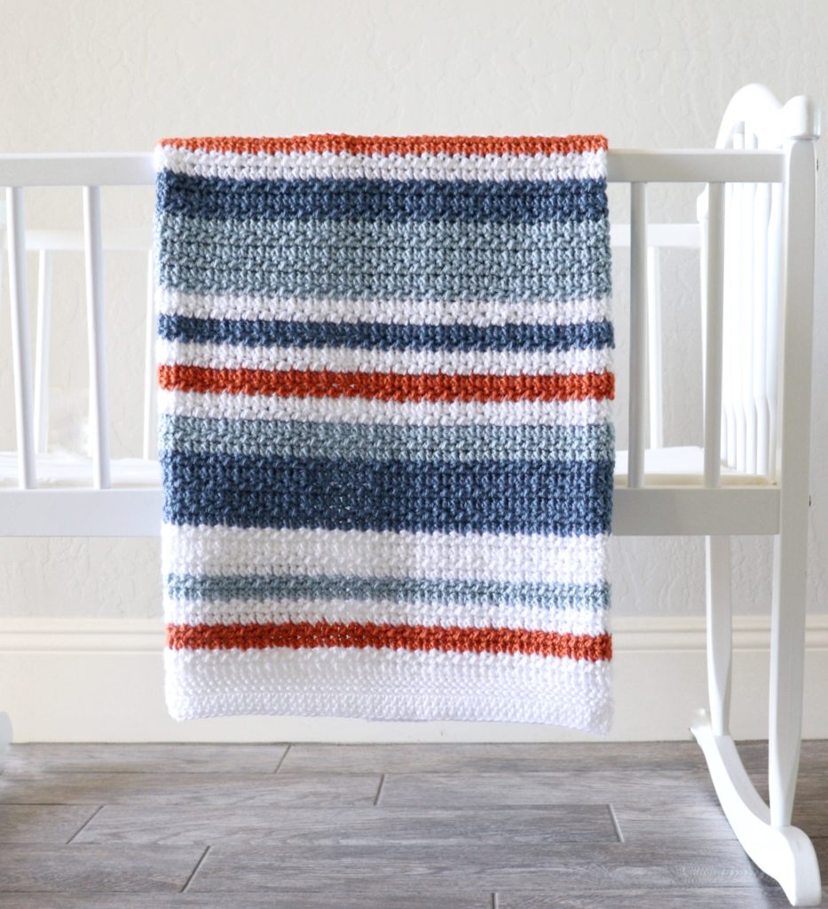 country blue stripes blanket on crib