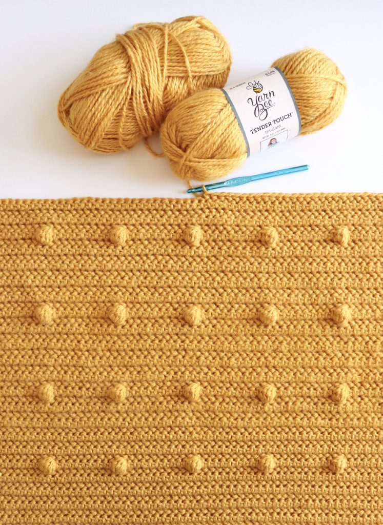 gold polka dots blanket in progress