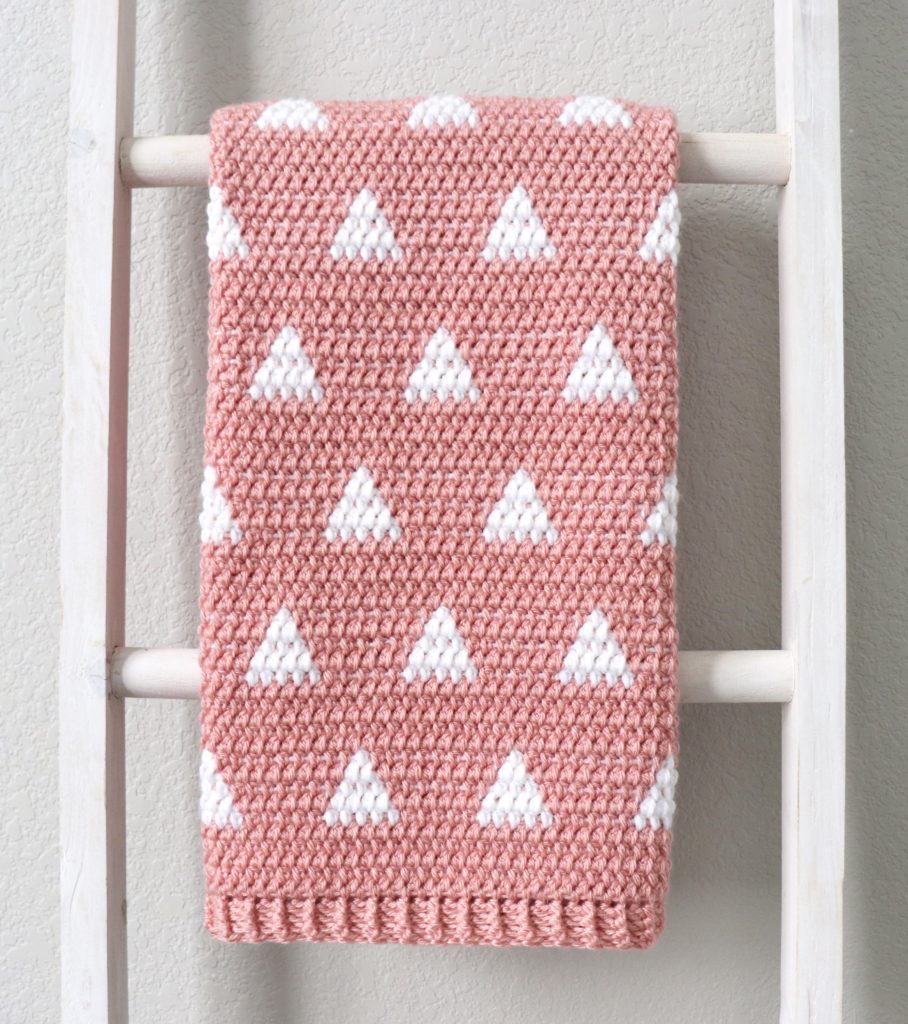 pink and white triangles blanket