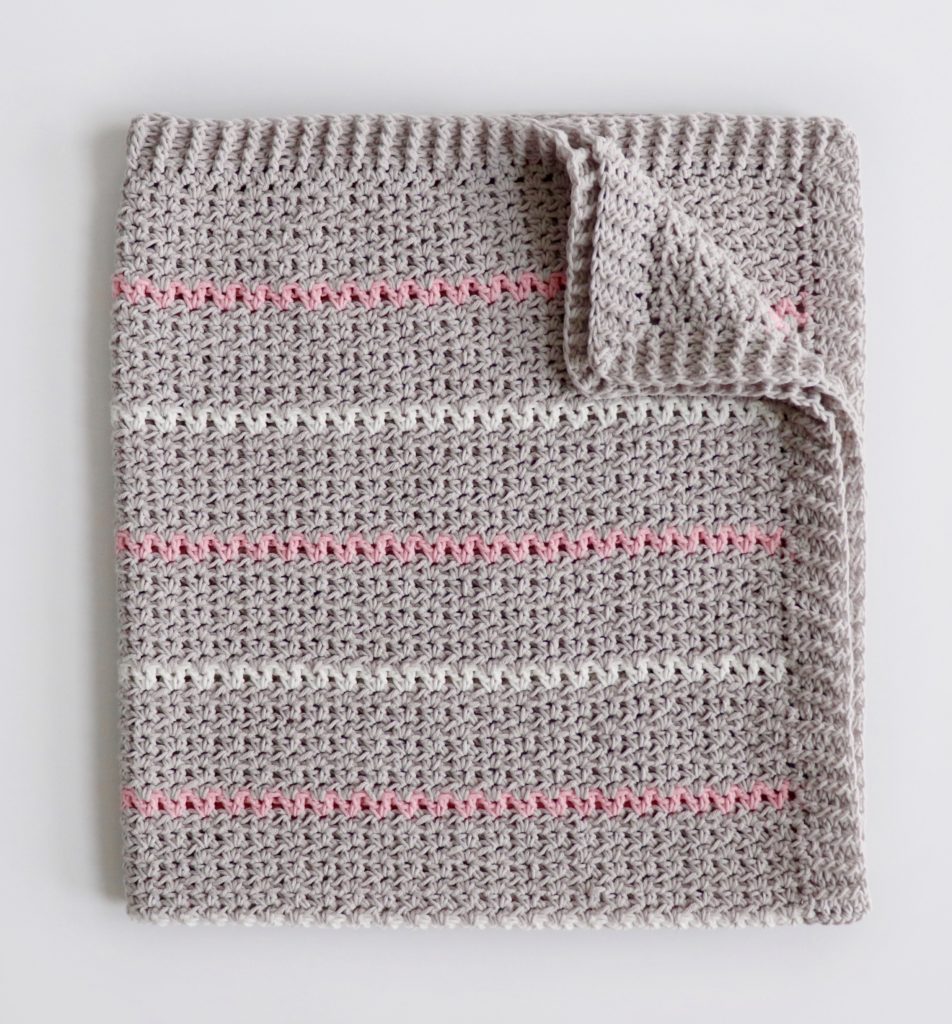 gray white pink crochet blanket