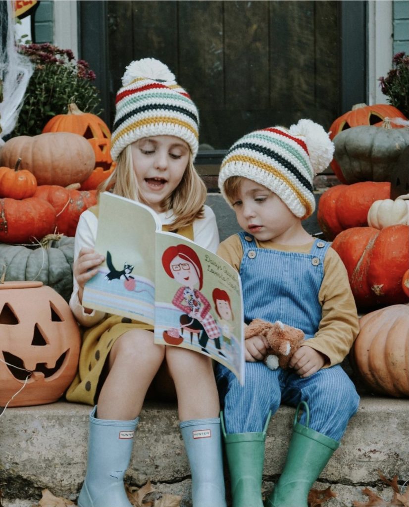 boy and girl wearing vintage stripes beanies