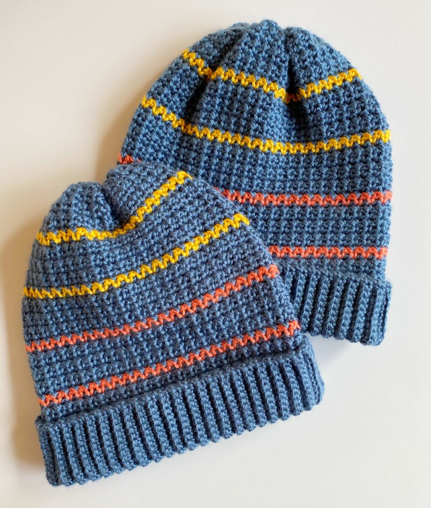 blue gold and orange mesh stitch hats