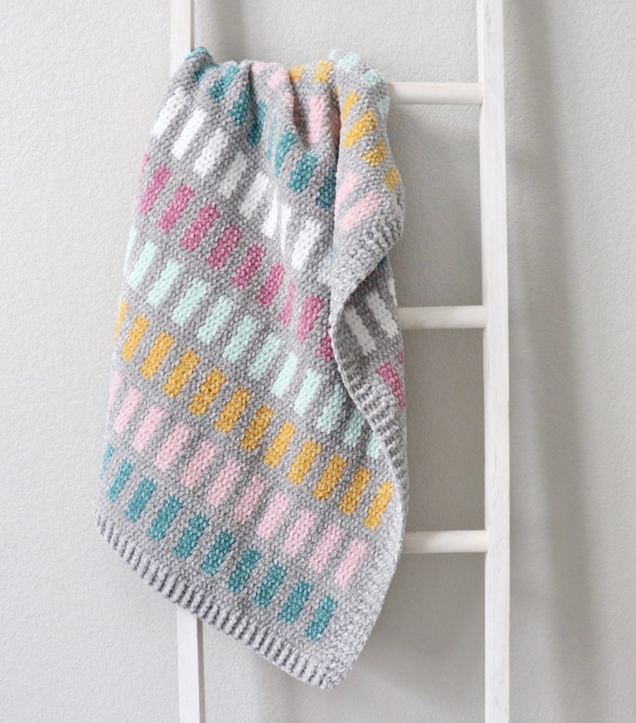 crochet velvet blanket on ladder