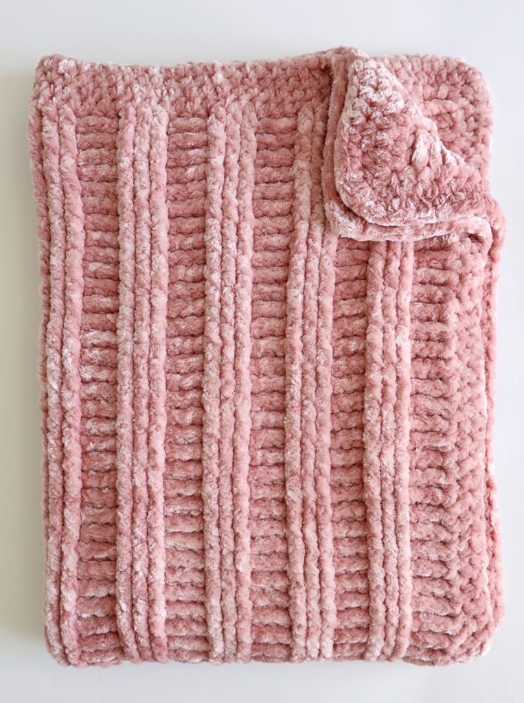 velvet textured crochet blanket folded
