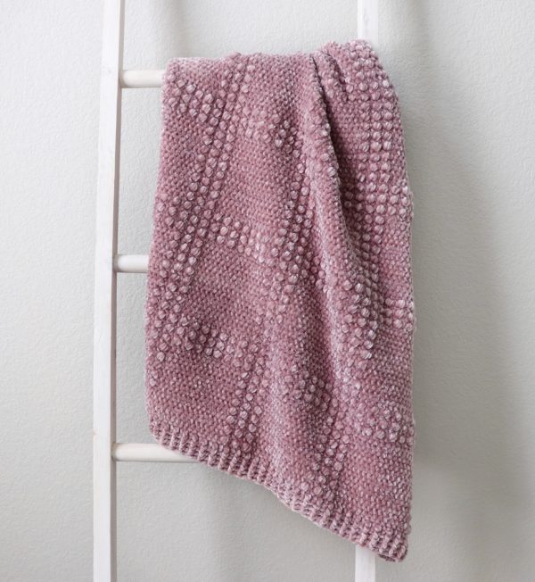 velvet crochet textured windowpane throw on ladder
