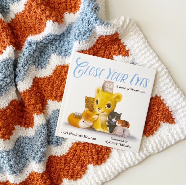 crochet blanket with picture book