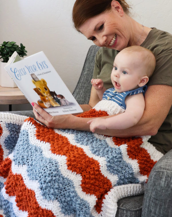 tiffany reading picture book to baby Jack