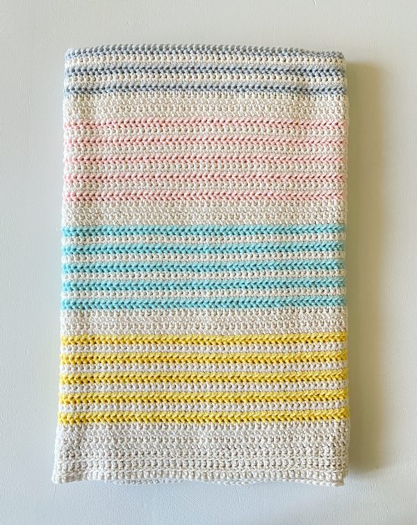striped crochet blanket folded