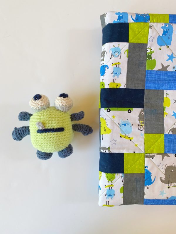 crochet monster with quilt