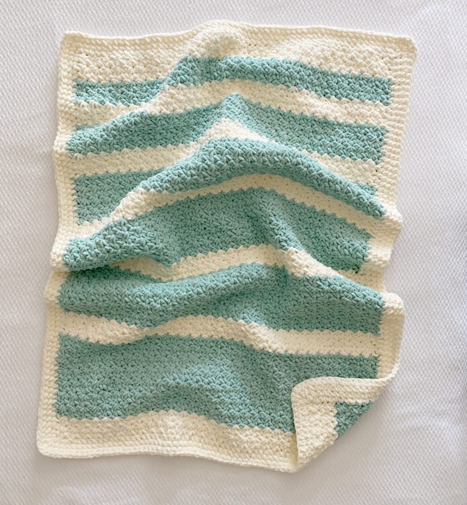 teal and cream crochet blanket