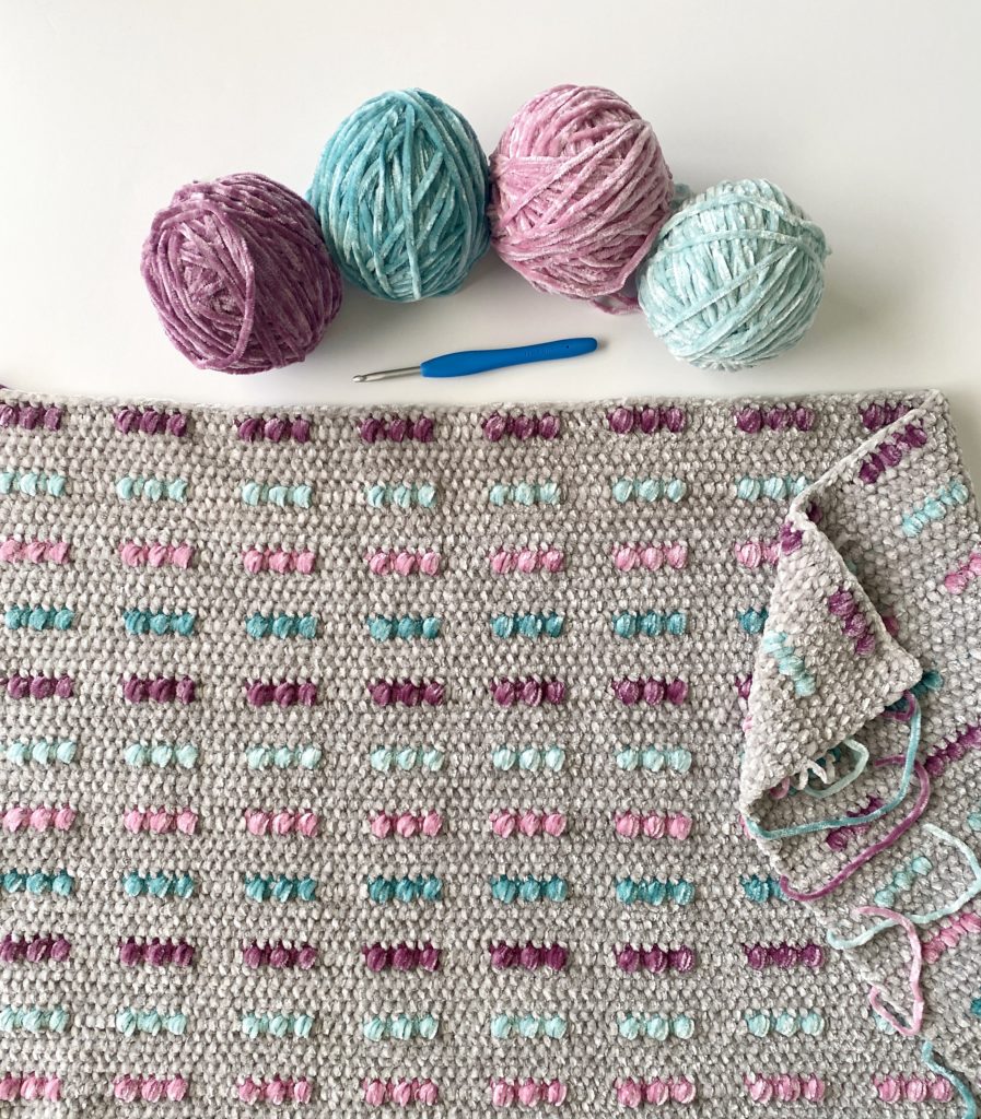 colorful puffs crochet blanket in progress