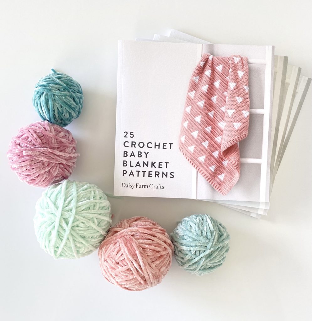 crochet pattern book with yarn