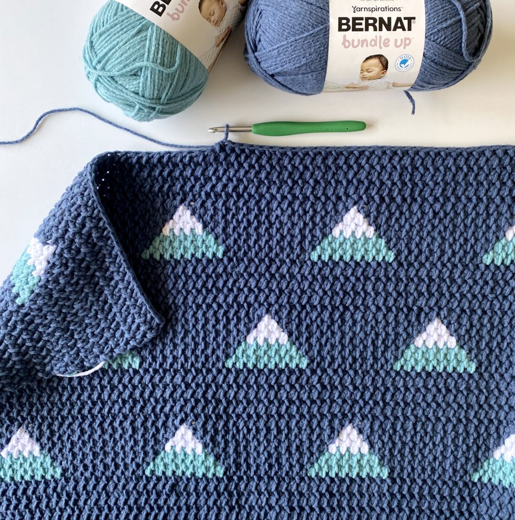 crochet blanket with mountain triangles in progress