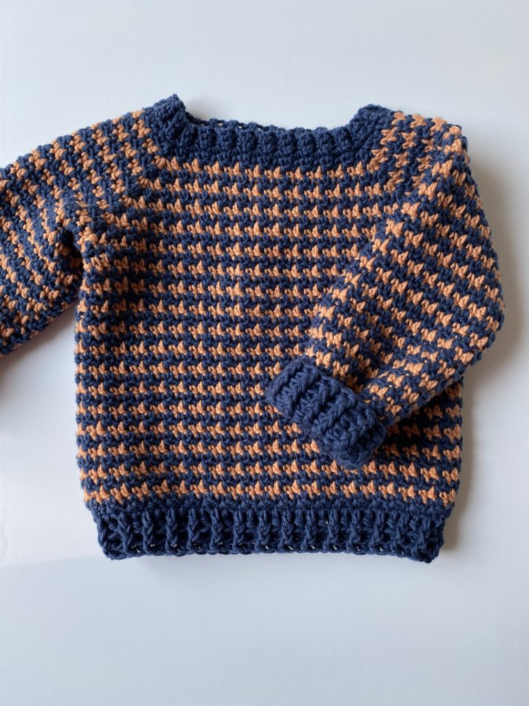 navy and orange crochet sweater