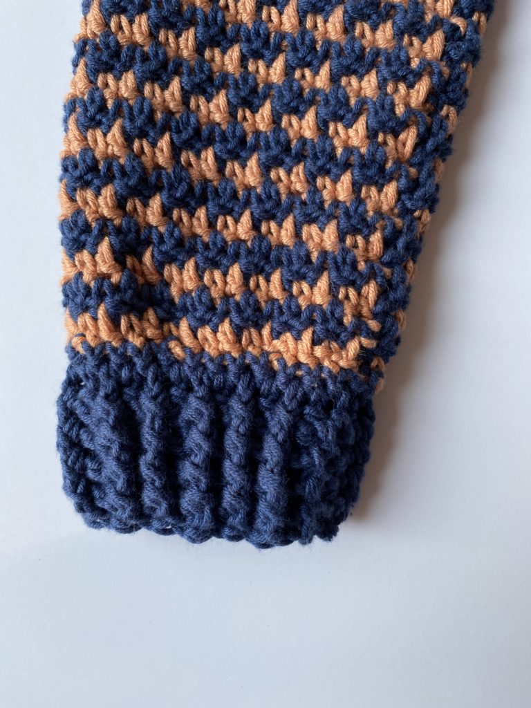 sleeve of crochet sweater