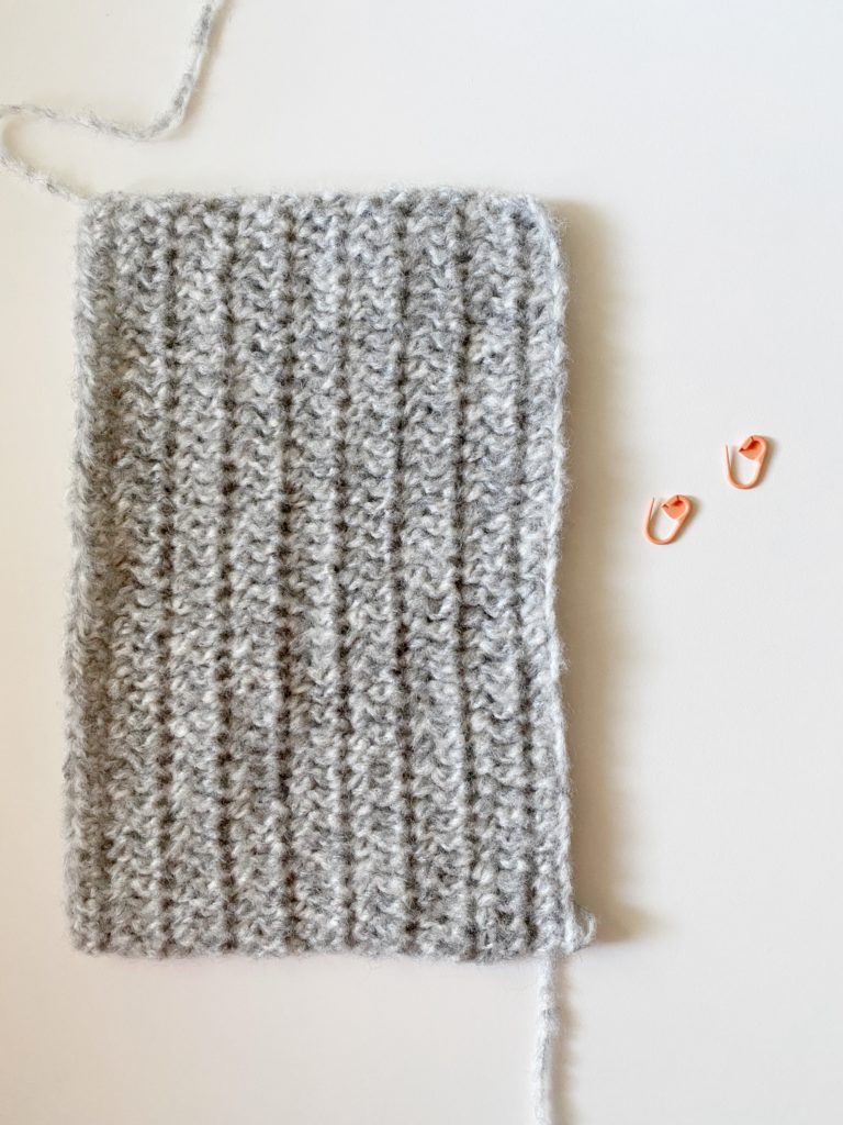 close up of crochet mitten in progress