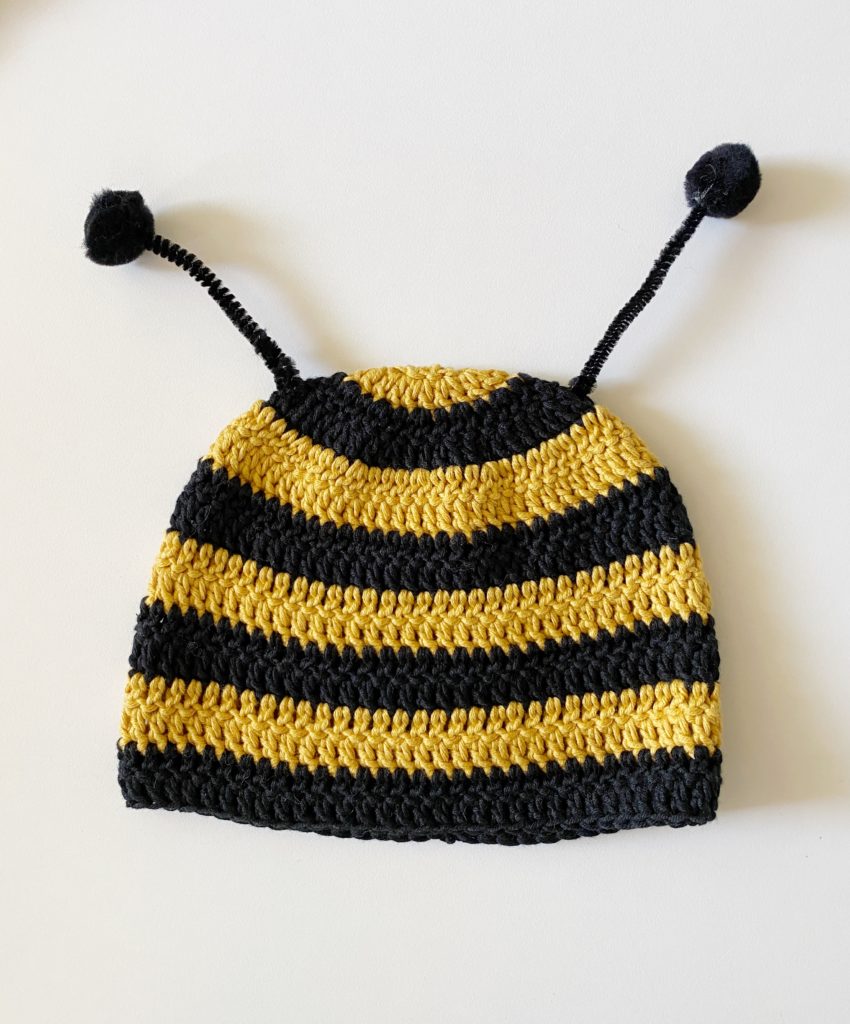 black and gold striped crochet hat