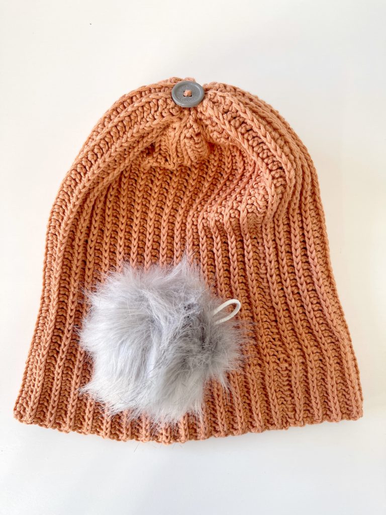 orange crochet cotton beanie with gray fur pom pom