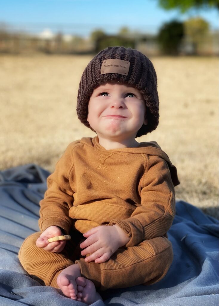 baby wearing crochet hat