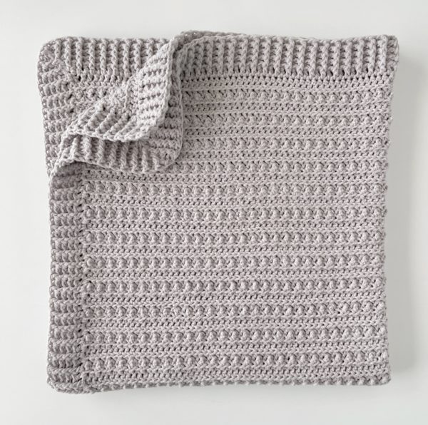crochet textured blanket folded