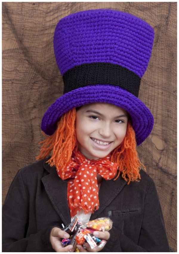 crochet purple hat with orange yarn hair