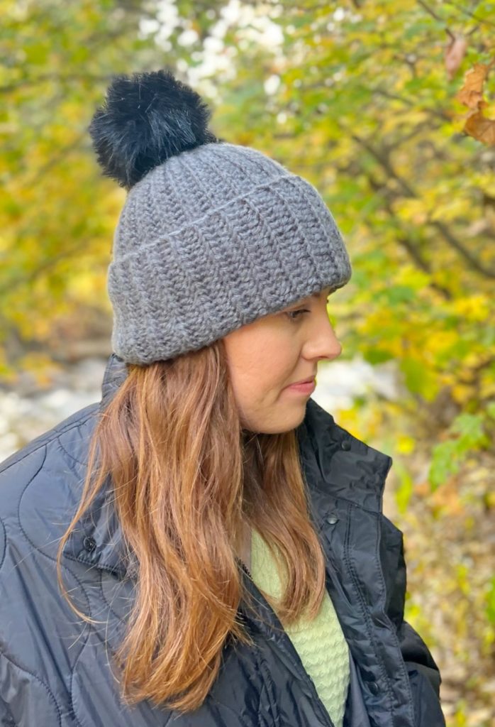 girl wearing beanie in nature