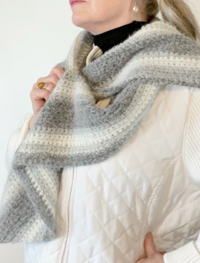 woman wearing gray scarf
