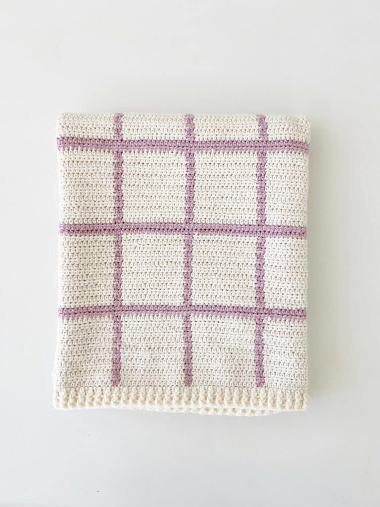 crochet windowpane blanket in cream and lavender