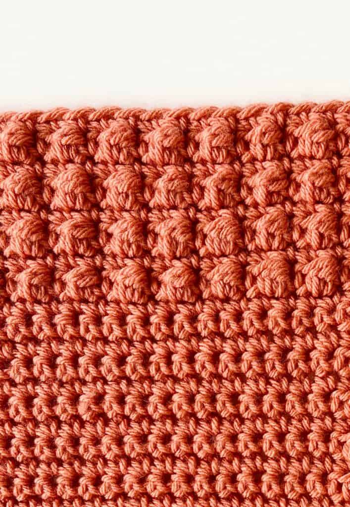 picture of berry stitch and single crochet used for red blanket