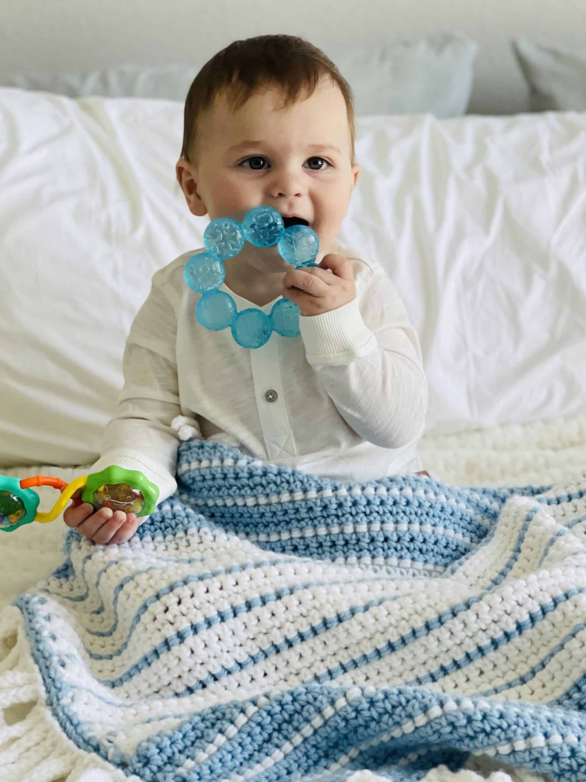 Baby James And A Crochet Blue And White Stripe Blanket - Daisy Farm Crafts