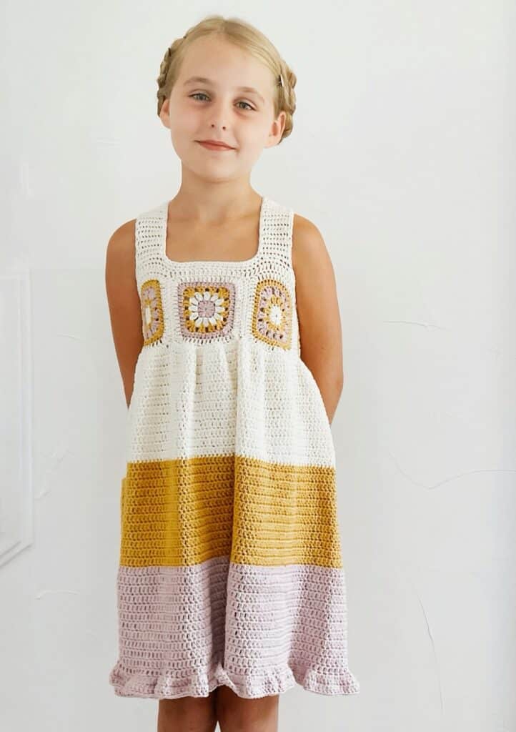 young girl wearing crochet dress