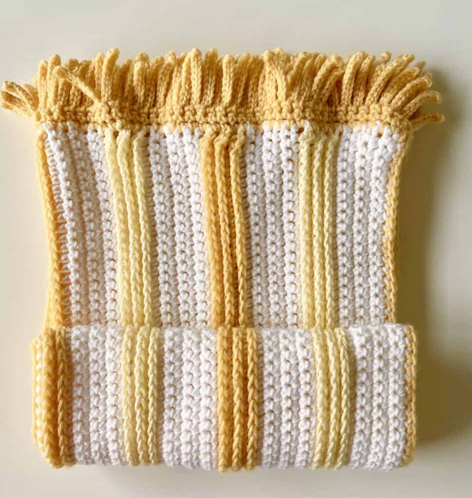 yellow and white crochet blanket