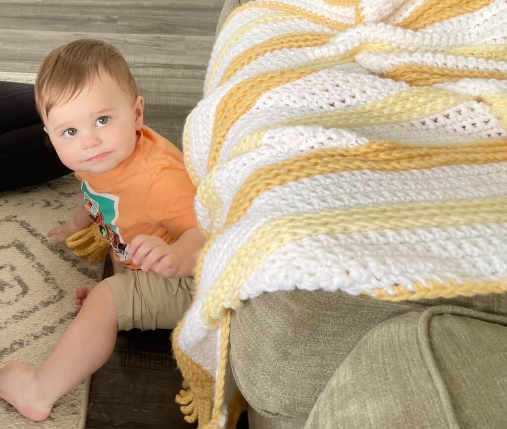 baby with crochet blanket 