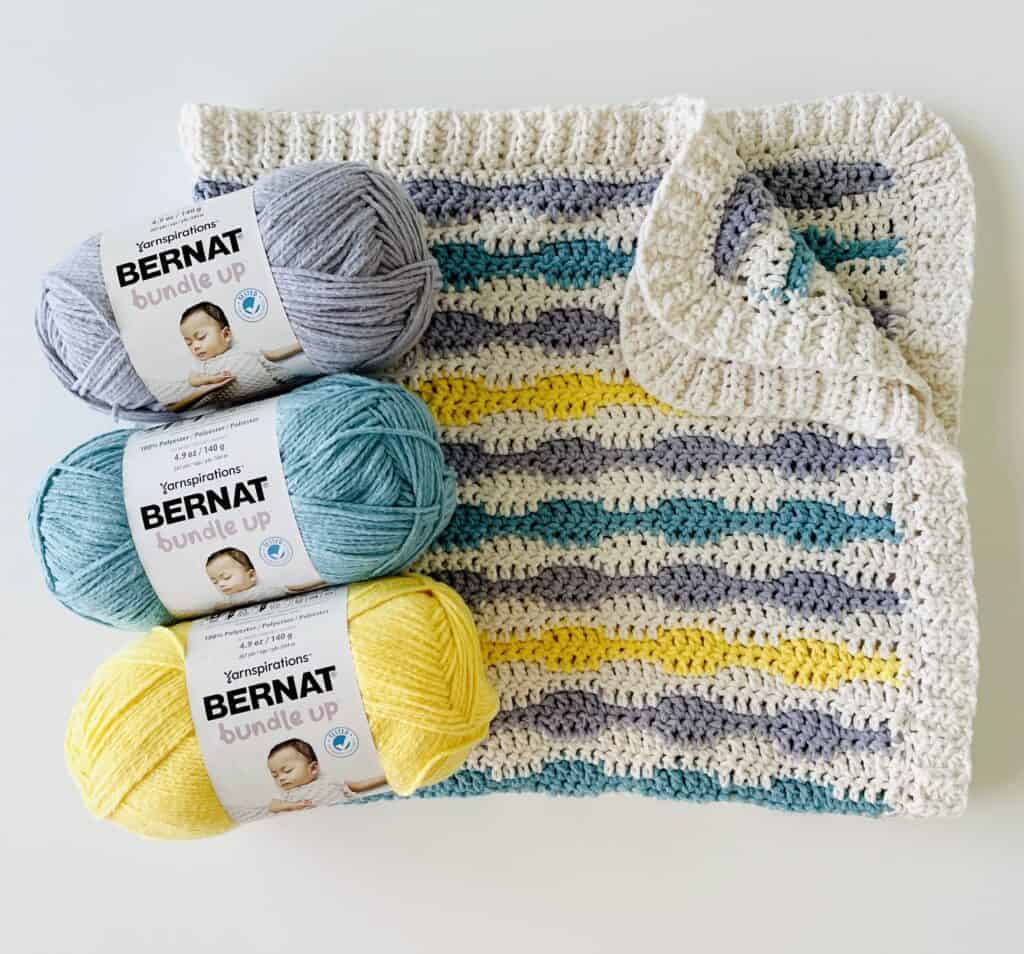 crochet blanket with 3 skeins of yarn